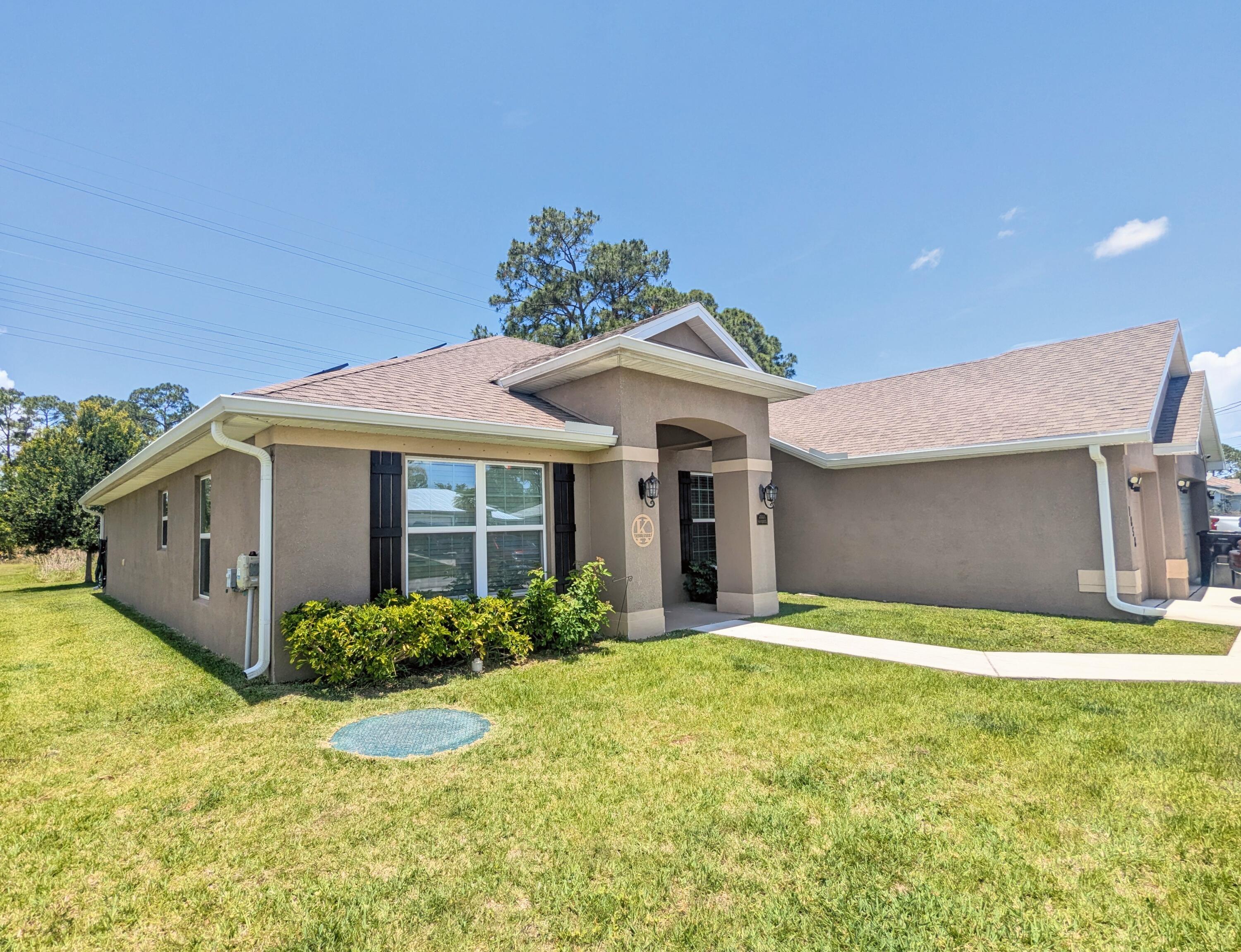 1858 SW Mackenzie Street, Port St. Lucie, FL 34953 — photo 1